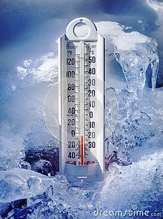 Ice cold thermometer in ice and snow Stock Photo