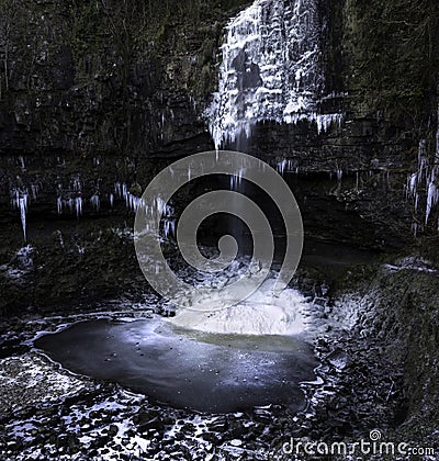 Ice covered Henrhyd Falls Stock Photo