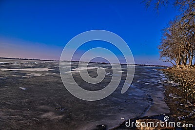 Ice covered Storm Lake in Iowa in Winter Stock Photo