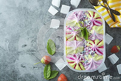 Ice cream assortment. Various fruit and berries ice cream in plstic box. Summer dessert. Top view. Copy space Stock Photo