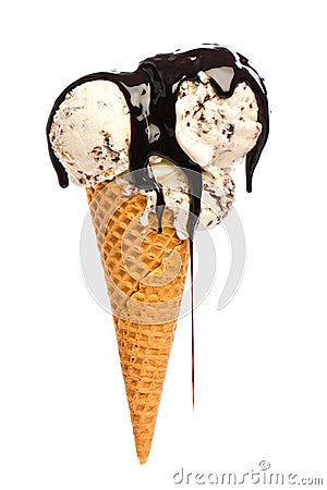 Ice cream: Ice cream cone with Stracciatella and much chocolate sauce isolated on white background Stock Photo