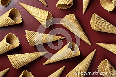 Ice cream cones pattern. Brown background. Sweet, summer and empty concept. Stock Photo