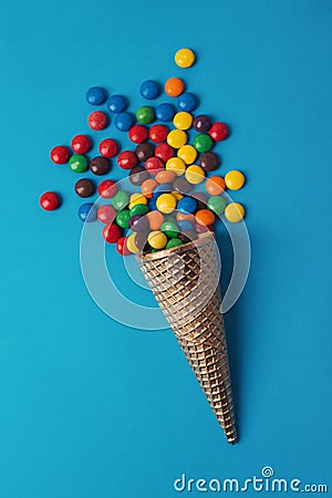 Ice cream in cornet with colorful bonbons Stock Photo
