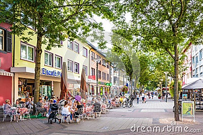 Ice cream parlor with terrace in a pedestrian street of Kehl, Germany Editorial Stock Photo