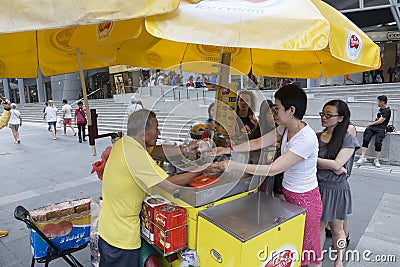 Ice cream seller in Singapore Editorial Stock Photo