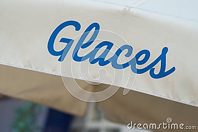 Ice cream store front sign in french text glaces, traduction of ice cream Stock Photo