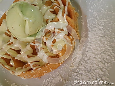 Ice cream waffles with melted white chocolate Stock Photo