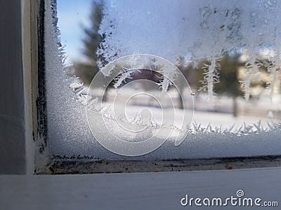 Ice crystals in window Stock Photo