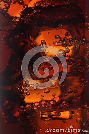 Ice cubes in cola. Background Stock Photo