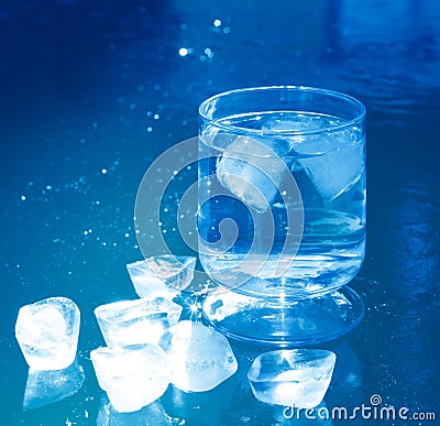 Ice cubes on an iced water surface Stock Photo
