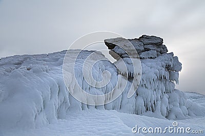 Ice dragon from frozen rock Stock Photo