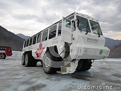 White Ice Explorer Bus on Athabasca Glacier Editorial Stock Photo