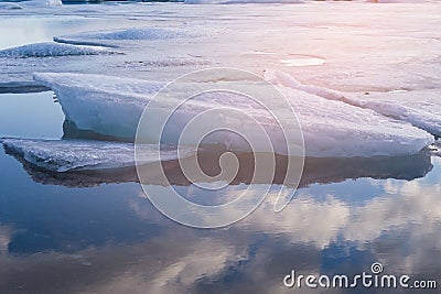Ice on frozen lake, Jokulsarlon Iceland with sky reflection Stock Photo