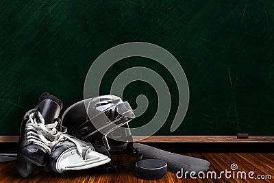 Ice Hockey Equipment and Chalk Board Copy Space Stock Photo