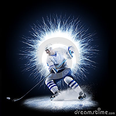 Ice Hockey player is skating on a abstract background Stock Photo