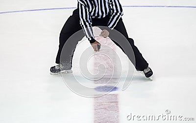 Ice Hockey referee a puck in your hand Stock Photo