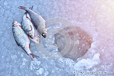 Ice hole fishing. Winter fishing in freezing cold weather concept Stock Photo