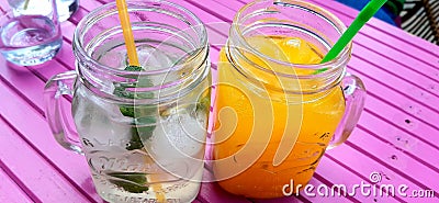 Ice, lemonade. It's a bright orange lemonade. Mango. Mojito. Ukraine Stock Photo