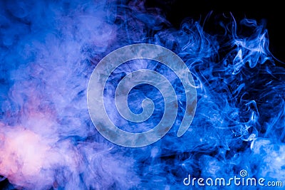 Ice pattern of a rising pair of blue exhaled vape neon blue on a black background with curly streams of smoke Stock Photo