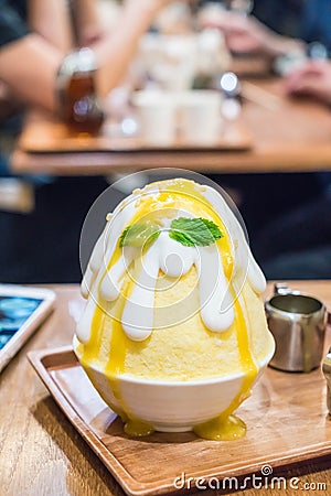 ice shave with mango sauce (mango bingsu) Stock Photo