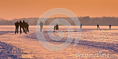 Ice Skaters on frozen lake Editorial Stock Photo