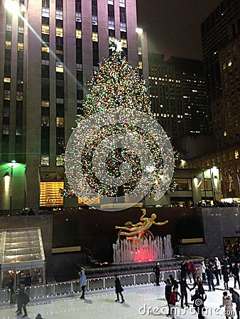 Ice Skating Rink and Christmas Tree in front of Rockefeller Center. Editorial Stock Photo