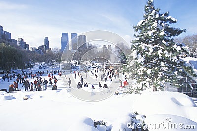 Ice skating Wollman Rink in Central Park, Manhattan, New York City, NY after winter snowstorm Editorial Stock Photo