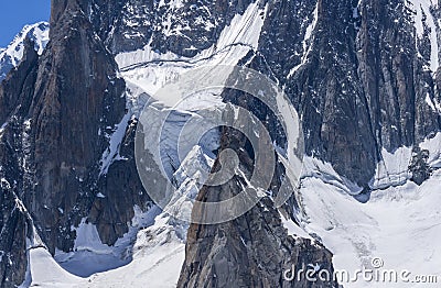 Ice snowy seracs and rocks in the upper parts of the Mont Blanc massif Stock Photo
