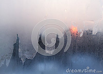 Ice and sun on winter windowpane Stock Photo