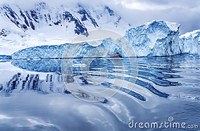 Iceberg Reflection Snow Mountains Blue Glaciers Dorian Bay Antarctica Stock Photo