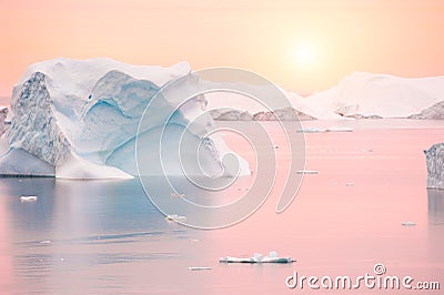 Icebergs at sunset, Greenland Stock Photo