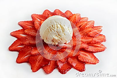 Icecream on flower-shaped strawberries slices Stock Photo