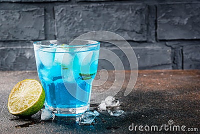 Iced blue alcohol cocktail Stock Photo