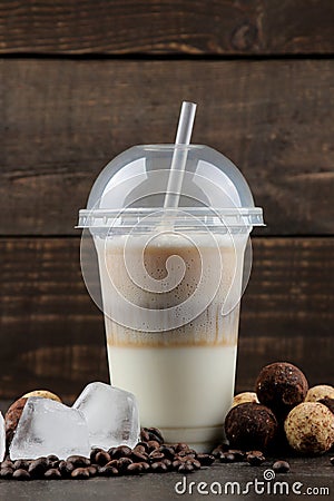 Iced coffee. Cold latte coffee in a plastic cup. coffee to go. summer cold drink Stock Photo