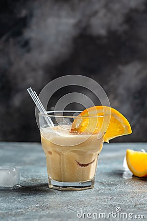 Iced coffee. Cold refreshment summer coffee drink in glasses on concrete stone background. vertical image. place for Stock Photo