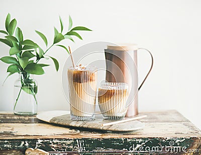 Iced coffee drink in tall glasses with milk, horizontal composition Stock Photo