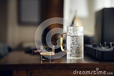 Iced americano coffee in glass on work table at home Stock Photo