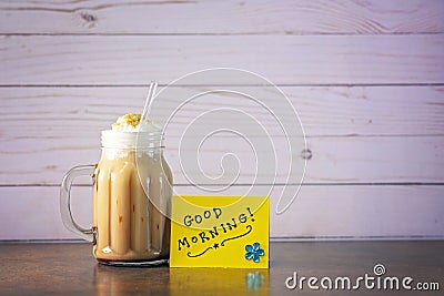 Iced Coffee to Start the Day with a Good Morning Message Stock Photo