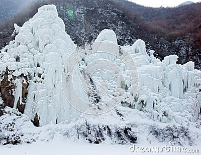 Spectacular ice falls in mountainous area. Stock Photo