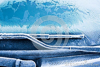 The ice-cold frost forms ice crystals in beautiful unique patterns on the Car Stock Photo