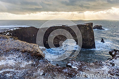 Iceland dyrholaey rock arch, winter in Iceland, dyrholaey arch in winter Stock Photo
