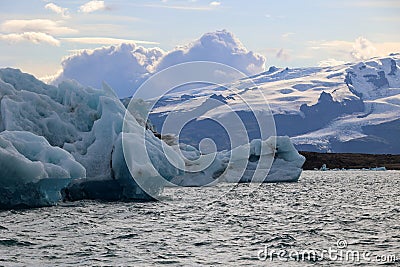 Iceland iceberg in Jökulsárlón glacier lagoon with Vatnajökull National Park in the background Stock Photo