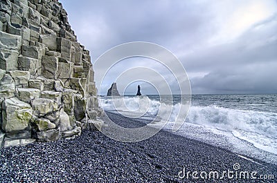 Iceland, Reynisfjara Beach, cliffs and characteristic stretch of sea Stock Photo