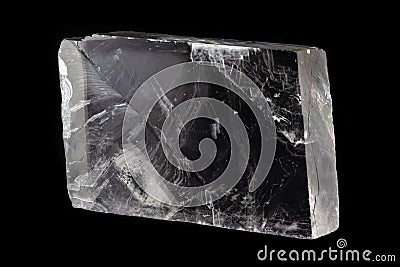 Iceland spar also known as transparent calcite mineral from Mexico, isolated on a pure black background Stock Photo