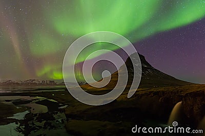 Iceland volcano with northern light Stock Photo