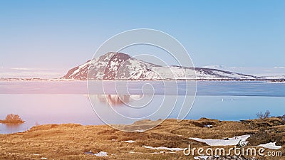 Iceland volcano with water lake with blue sky background Stock Photo