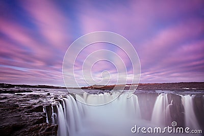 Iceland waterfall Dettifoss in Iceland nature landscape. Famous tourist attractions and landmarks destination in Icelandic nature Stock Photo