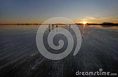 Iceskating on a dutch lake Editorial Stock Photo