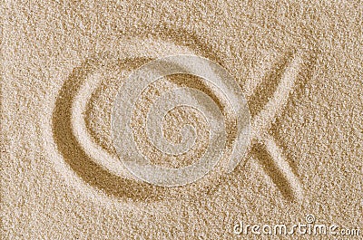 Ichthys, Jesus Fish symbol, drawn in sand macro photo Stock Photo