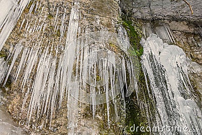 Icicles up the swift creek. Stock Photo